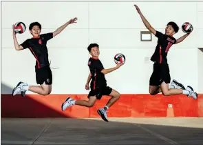  ?? TERRY PIERSON – STAFF PHOTOGRAPH­ER ?? The Vang brothers, from left, junior Txajkhai, freshman Koobpheej and senior Ywjpheej have helped the Rancho Verde boys volleyball team reach new heights this season.