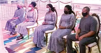  ?? PHOTO: JESUTOMI AKOLOMADE ?? T. B Joshua’s Son- in- law, Bryan, Serah, Promise, Hart ( daughters), and Evelyn Joshua ( wife) at the lying- in- state service for late T. B. Joshua at SCOAN, Ikotun, Lagos.