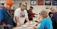  ??  ?? The Woman’s Club of Oley joined Oley Valley American Legion Post 878 to host a pancake and sausage breakfast at Hope Rescue Mission in Reading for needy and homeless veterans.