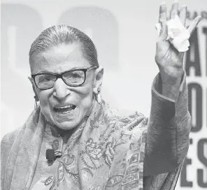  ?? CLIFF OWEN/ AP ?? Supreme Court Associate Justice Ruth Bader Ginsburg waves to the audience after speaking at the Library of Congress National Book Festival in Washington, D. C., in late August.