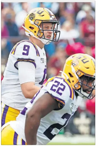  ?? [ROGELIO V. SOLIS/THE ASSOCIATED PRESS] ?? LSU quarterbac­k Joe Burrow is leading the nation with 29 touchdown passes and his 2,484 yards passing ranks second.