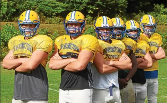  ?? PETE BANNAN — DIGITAL FIRST MEDIA ?? The Downingtow­n East defensive line includes Will Kiely, Shane Hogarth, Joe Janick, Nadier Johnson, Connor Munnelly and Nica Hesel.