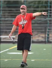  ??  ?? Coach Matt Mendoza Wednesday at Frank Skadan Stadium in Lindsay.