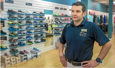  ?? PHOTOS: GRANT MATTHEW/STUFF ?? Nick Bull, the owner of New Plymouth’s Shoe Clinic, said basically all of his sales are in store – not online.