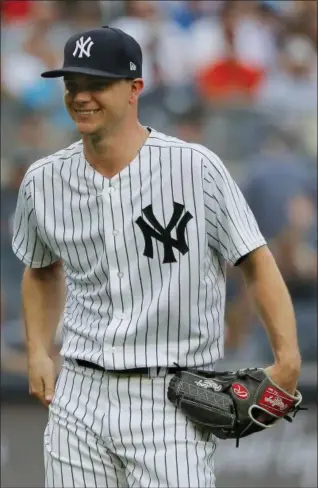  ?? JULIE JACOBSON — THE ASSOCIATED PRESS ?? Sonny Gray, left, reacts as he leaves game during the third inning of Yankees’ 7-5 loss to Orioles on Wednesday. Gray allowed seven runs in 2 2⁄3 innings.