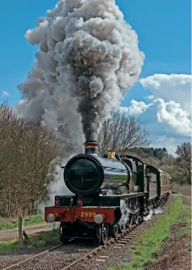  ?? JOHN TITLOW ?? About to climb Eardington Bank: No. 2999 Lady of Legend digs in passing Hay Bridge with a test train on April 4.