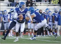  ??  ?? Bruno Guberinich (right, blocking) has been Detroit Catholic Central’s top offensive linemen this season while helping the Shamrocks to a 9-0 record.