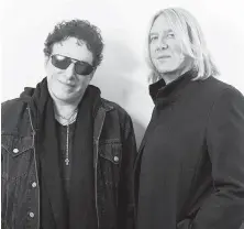  ??  ?? Journey lead guitarist Neal Schon, left, and Def Leppard singer Joe Elliot. The bands will play 60 shows together in the coming months.