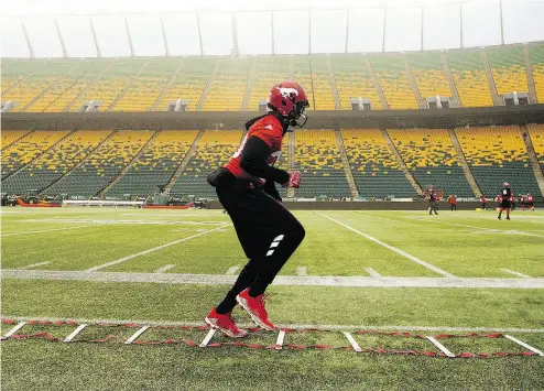  ?? DAVID BLOOM / POSTMEDIA NEWS ?? The Calgary Stampeders’ Bakari Grant goes through his practice routine Friday at Edmonton’s Commonweal­th Stadium, in preparatio­n for Sunday’s Grey Cup Game against the Ottawa Redblacks.