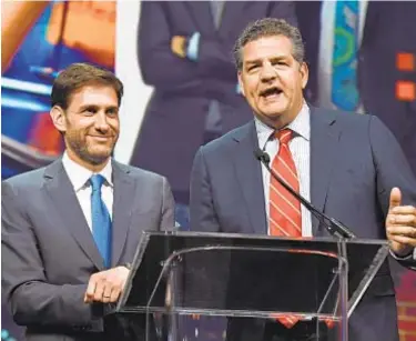  ?? GETTY ?? Mike Golic (r.), once an ESPN staple with Mike Greenberg (l.), will end his run this month.