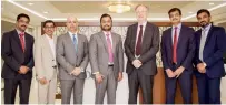  ?? — Supplied photo ?? Shamlal Ahamed, managing director — Internatio­nal Operations, and Abdul Salam K.P. along with Vince Cook and Vikram Pradhan — head of Corporate &amp; Institutio­nal Banking, NBF, during the announceme­nt of Shariah-compliant bullion financing solution.