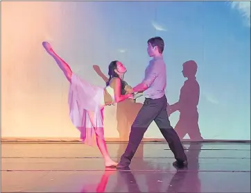  ?? PHOTO BY ANNA-SOFIA LESIV ?? Winnie Mu, left, and Jacob DalPorto, right, perform a duet dance titled “Summer” at the Ann Woo memorial on Saturday at the center for Chinese Performing Arts of America in San Jose.