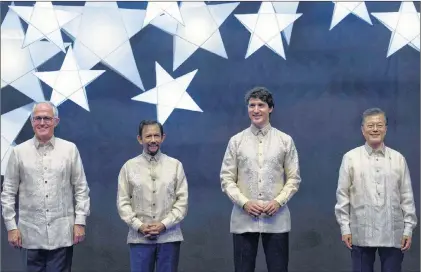  ?? CP PHOTO ?? Canadian Prime Minister Justin Trudeau poses with Australian Prime Minister Malcolm Turnbull, left, Sultan of Brunei Hassanal Bolkiah and South Korean President Moon Jae-in at the Associatio­n of Southeast Asian Nations Summit family photo in Manila,...