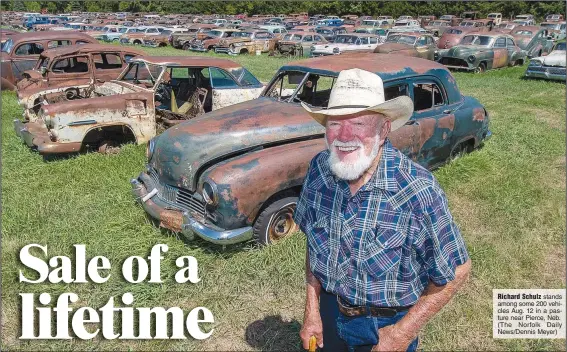  ?? (The Norfolk Daily News/Dennis Meyer) ?? Richard Schulz stands among some 200 vehicles Aug. 12 in a pasture near Pierce, Neb.