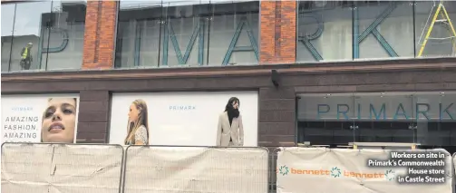  ??  ?? Workers on site in Primark’s Commonweal­thHouse store in Castle Street