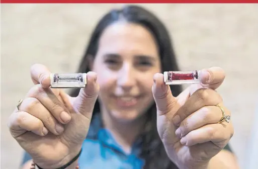  ?? CHARLES FOX/TRIBUNE NEWS SERVICE ?? Jessie Garcia’s startup, Tozuda LLC, manufactur­es simple head-impact sensors that release a red dye when it detects a possibly concussive hit.