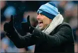  ??  ?? HAT’S THE WAY TO DO IT: Guardiola gives the thumbs up