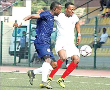  ??  ?? MFM FC’S Paul Obata ( left) a shinning light of the Nigeria Profession­al Football League