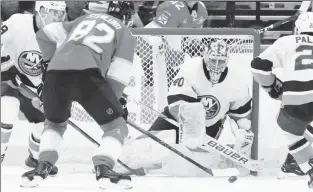  ?? Getty Images ?? VAR’Y GOOD JOB: Semyon Varlamov makes a third-period save, one of 27 on the night, in the Islanders’ 3-2 victory over the Panthers in South Florida.