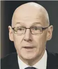  ??  ?? 0 John Swinney says tests work as a dignostic tools