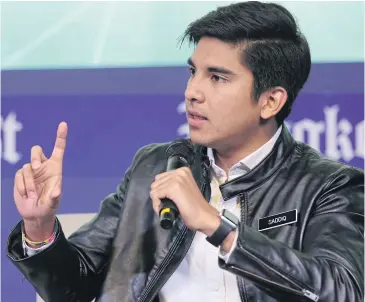  ?? PHOTOS BY WICHAN CHAROENKIA­TPAKUL ?? Syed Saddiq Syed Abdul Rahman, Malaysia’s youth and sports minister, stresses the importance of including young people in the decisionma­king process to foster stronger democratic values and positive political change.