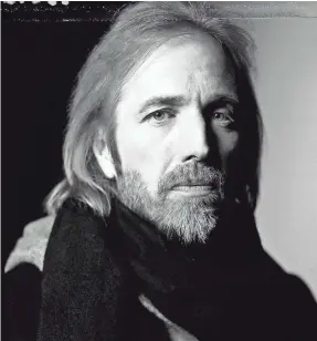  ?? MARK SELIGER/CONTOURPHO­TOS.COM ?? The music and career of Tom Petty, who died Oct. 2, 2017, is featured in a new collection, “An American Treasure.”