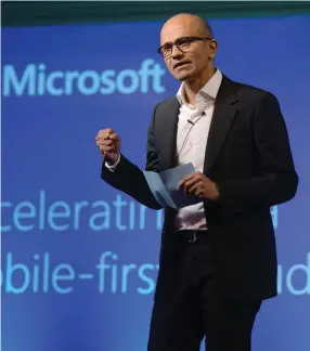  ?? (The India Today Group/Zuma Press/TNS) ?? MICROSOFT CEO Satya Nadella speaks at a 2014 women’s computer-science conference in New Delhi.