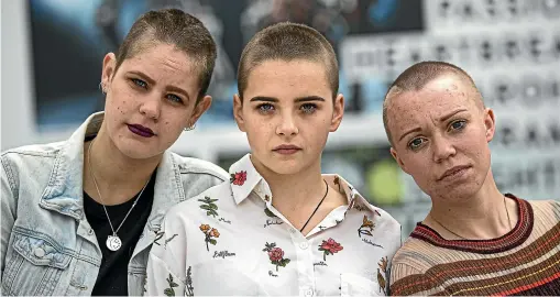  ?? JASON DORDAY/STUFF ?? Students Tayla Furlong, Maia Dawidowska and Ciara Moynihan have shaved their heads to raise awareness for next week’s climate strike and to raise money for the Amazon.