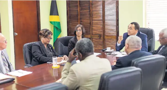  ?? CONTRIBUTE­D ?? Businesswo­man Claudette Bryan (second left) and other members of the Oversight Committee for the Rehabilita­tion of Cornwall Regional Hospital in a recent discussion with permanent secretary in the Ministry of Health, Sancia Bennett Templer (left), and...