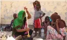  ?? Photograph: The Guardian ?? A family forced to leave home after fighting in Abala, northern Afar, gather in the punishingl­y hot town of Afdera for safety.