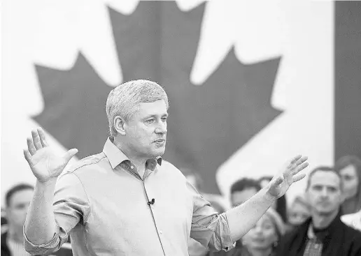  ?? Jonathan Haywa rd / The Cana dian Press ?? Conservati­ve Leader Stephen Harper attends a campaign event at an apple farm in Waterloo, Ont., Monday.