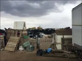  ?? TAOS COUNTY SHERIFF’S OFFICE VIA AP ?? Eleven children were found in filthy conditions and hardly any food at this rural New Mexico compound, a sheriff said Saturday.