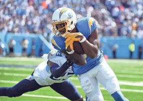  ?? CHRISTOPHE­R HANEWINCKE­L/USA TODAY SPORTS ?? Wide receiver Mike Williams, released by the Los Angeles Chargers, will draw interest from other NFL teams.
