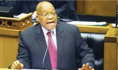  ?? PICTURE: GCIS ?? BELEAGUERE­D: President Jacob Zuma answering questions in Parliament yesterday.
