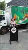  ??  ?? Capital Roots CEO Amy Klein addresses the crowd at the unveiling of the new solar-enhanced Veggie Mobile.