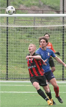  ?? Photograph­s by AMANDA EMARY. ?? Above: Nathan Lugton has eyes only for the ball in United’s 3-0 win over Old Scotch on Saturday.