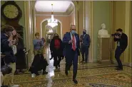  ?? SUSAN WALSH — THE ASSOCIATED PRESS ?? Senate Minority Leader Sen. Chuck Schumer of N.Y., walks past reporters on Capitol Hill in Washington on Tuesday.