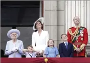  ?? AARON CHOWN — POOL PHOTO ?? Queen Elizabeth II, Kate, duchess of Cambridge, Prince Louis, Princess Charlotte, Prince George, and Prince William watch from the balcony of Buckingham Place in London after the Trooping the Color ceremony on Thursday.