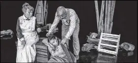  ?? Stoo MEtZ/tHE Canadian PRESS ?? Troy Adams, right, as Edward, Lisa Nasson, centre, as Genevieve, and Mauralea Austin, as Greer, are seen performing in “Lullaby: Inside The Halifax Explosion” in an undated handout photo.