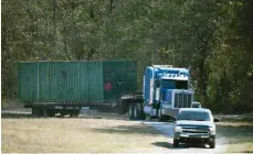  ?? — AP ?? WOODRUFF: The shipping container that an abducted woman was held in for two months is removed from Todd Kohlhepp’s property in Woodruff, SC.