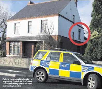  ?? MARK MARLOW/ALAN LEWIS ?? Police at the scene of the burglary in Aughnacloy. Circled, the first storey window the elderly woman fell from