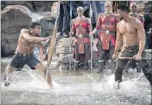  ?? Matt Kennedy Marvel Studios ?? CHADWICK BOSEMAN (T’Challa), left, and Michael B. Jordan (Erik Killmonger) power Marvel’s thrilling “Black Panther.”