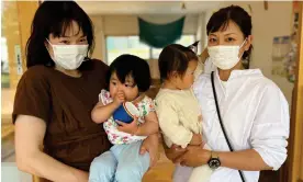  ?? ?? Yuko Sugawara, left, and Manami Kuroyabu at a drop-in daycare facility in Nagi, where the birth rate is more than twice Japan's national average. Photograph: Justin McCurry/The Guardian