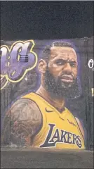  ?? FOTO: EFE ?? LeBron, Laker en grafitti