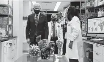  ?? Associated Press file photo ?? President Joe Biden visits the Viral Pathogenes­is Laboratory at the National Institutes of Health in Bethesda, Md.