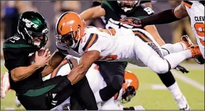  ?? AP/BILL KOSTROUN ?? Cleveland Browns defensive end Myles Garrett leads the NFL with five sacks this season, but he was also flagged twice for roughing the passer against the New York Jets on Monday.