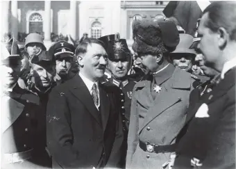  ??  ?? Adolf Hitler and ‘Crown Prince’ Wilhelm during the Day of Potsdam celebratio­ns, Potsdam, Germany, March 21, 1933