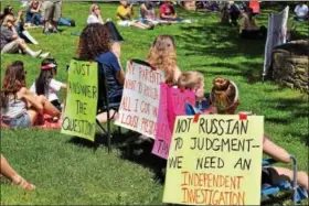  ?? MARIAN DENNIS – DIGITAL FIRST MEDIA ?? Activists gather at Riverfront Park June 3 to voice their concerns about transparen­cy in government during the March for Truth in Pottstown.