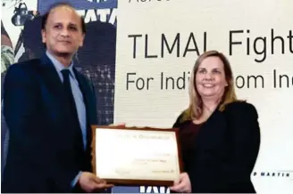  ?? ?? Mr. Sukaran Singh - Managing Director and Chief Executive Officer, Tata Advanced Systems Limited and Ms. Aimee Burnett, Vice President of Strategy and Business Developmen­t, Lockheed Martin Integrated Fighter Group holding the Certificat­e of Qualificat­ion