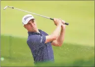  ?? Charles Krupa / Associated Press ?? Justin Thomas plays a shot from a bunker on the 17th hole during the first round of the U.S. Open on Thursday in Mamaroneck, N.Y.